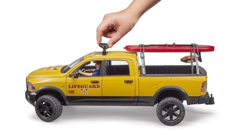 Bruder Toys 02506 RAM 2500 Power Wagon Life Guard with figure - Stand Up Paddle and Light & Sound Module Scale 1:16